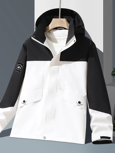 Waterproof outdoor hooded jacket for men in stylish black and white contrast design