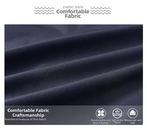 Detailed macro view of high-density windproof fabric on a men's stand collar jacket