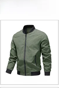Detail view of military green bomber jacket with geometric patterns and ribbed cuffs