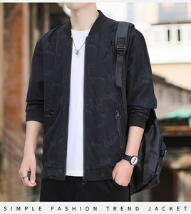 Detail of black jacket with grey marble texture, baseball collar and metal ring zipper