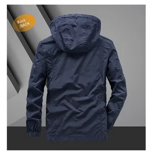 Rear view of dark blue men's hooded windbreaker with textured windproof fabric