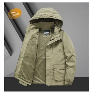 Detail of khaki outdoor jacket showing black mesh lining and large cargo pocket with flap
