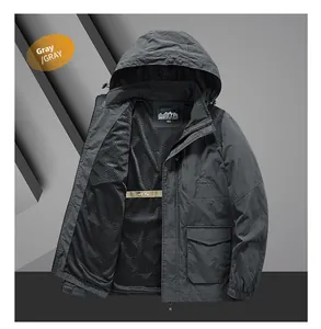 Detail of gray outdoor jacket showing windproof fabric and breathable mesh lining