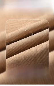 Macro detail of high-quality brown corduroy fabric made from 100% polyester material