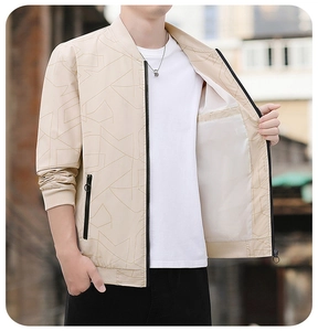Detail showing inner pocket and white lining of a printed men's slim bomber jacket