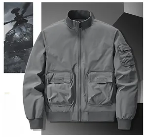 Detail of grey bomber jacket with functional sleeve pocket and ribbed cuffs in military style