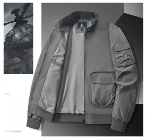 Detail of grey bomber jacket with metal zipper, ribbed cuffs and utility pockets
