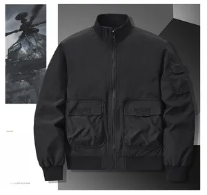 Detail of black bomber jacket featuring windproof stand collar and cargo pockets