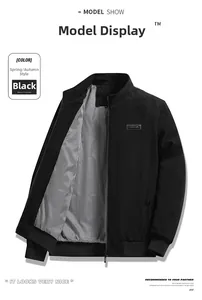 Detail of black men's winter jacket with textured vertical stripes and rib-knit cuffs