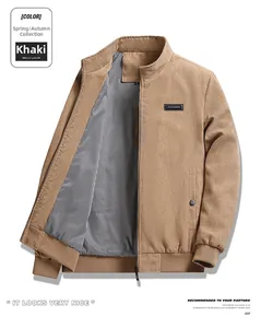 Detail of khaki corduroy jacket with ribbed cuffs and stand collar for winter