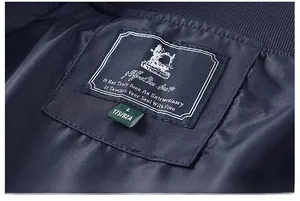 Detailed close-up of the jacket inner collar with woven brand label and size tag L