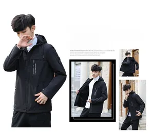 Detail of black hooded jacket featuring zippered pockets and sportmens sleeve patch