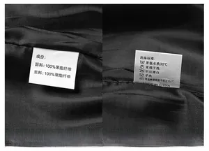 Detailed close-up showing wash care label and 100 percent polyester fabric texture