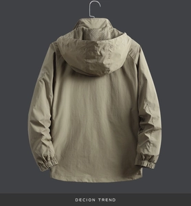 Detail of khaki jacket showing windproof hood with mesh lining and elastic cuffs