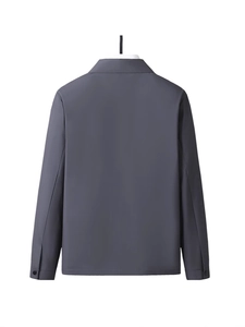 Back view of men's dark grey business casual lapel jacket with buttoned cuffs