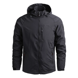 Detailed macro view of high-performance windproof nylon fabric and adjustable hooded jacket