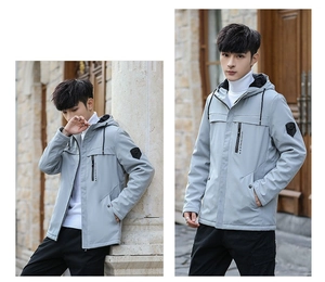 Detail view of men's hooded jacket with SPORTMENS logo zipper and sleeve crest badge
