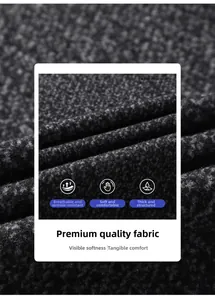 Detail of high-quality dark grey wool blend fabric showing soft texture and thick weave