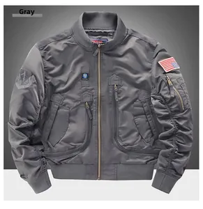 Detail of grey tactical bomber jacket featuring multiple utility pockets and zip arm pocket