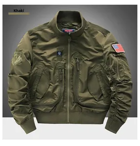 Detail of khaki tactical bomber jacket featuring embroidered patches and ribbed knit cuffs
