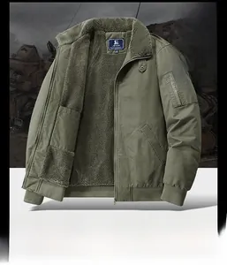 Detail of warm fleece lining and sleeve zipper pocket on military green bomber jacket