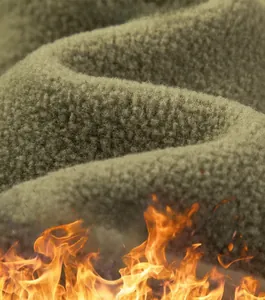 Close-up of olive green polar fleece fabric showing soft texture and thermal retention