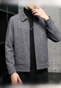 Detailed close-up of men's casual grey textured tweed jacket featuring premium zipper closure