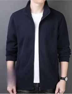 Detailed view of dark blue fleece jacket texture with durable wear-resistant finish