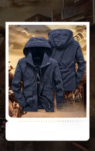 Close-up of windproof fabric texture and logo detail on navy men's outdoor jacket