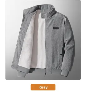 Detail of gray corduroy jacket showing thick white fleece lining and ribbed cuffs
