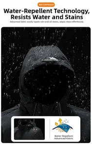 Waterproof detail of a black outdoor jacket with droplets on technical fabric surface