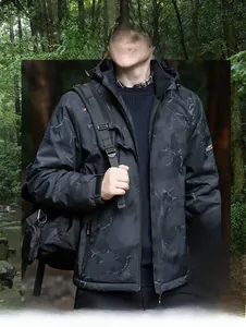 Detail of premium camouflage jacket featuring windproof fabric and warm fleece lining