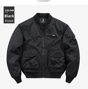 Detail of black flight bomber jacket with FREE SPIRIT patch and utility pockets