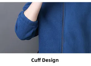 Detail of the elastic cuff design on a mid-blue polar fleece jacket for men