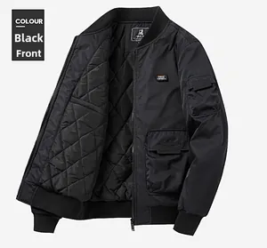 Detail of black bomber jacket featuring quilted lining and FREE SPIRIT patch