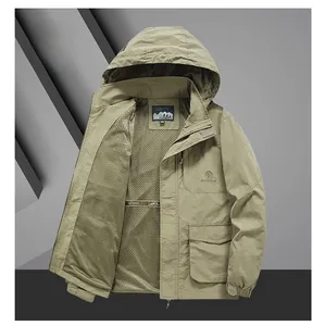 Detail of khaki outdoor jacket showing breathable mesh lining and zippered pocket