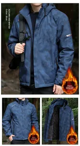 Detail view of blue camouflage waterproof jacket featuring warm black fleece lining