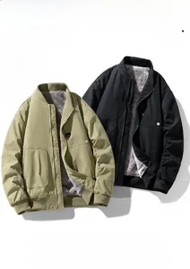 Close-up of warm fleece lining and ribbed collar on olive and black bomber jackets