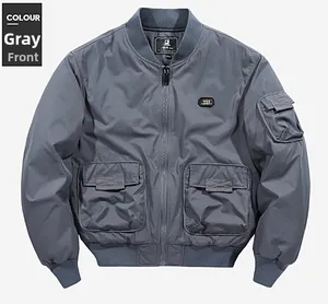 Detail of gray bomber jacket featuring Free Spirit patch and ribbed collar and cuffs