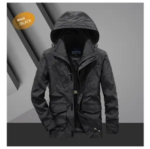Detail of black outdoor jacket featuring a high collar hood and durable nylon fabric
