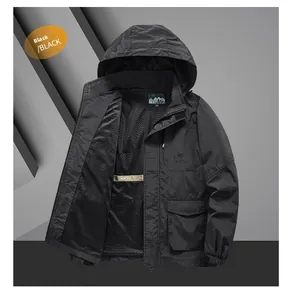 Detail view of black outdoor hooded jacket featuring mesh lining and zipper pockets