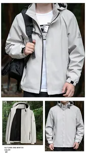Detail of light grey outdoor windbreaker with adjustable hood and velcro cuffs
