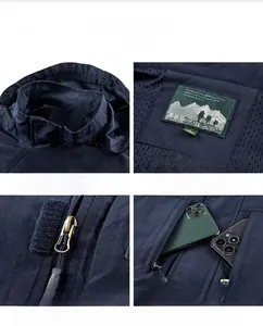 Detailed view of blue outdoor jacket with windproof collar, chest pocket and metal zipper
