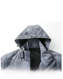 Detail of grey camo jacket showing technical honeycomb texture and breathable mesh lining