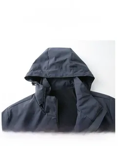 Detailed view of the detachable hood feature on the outdoor waterproof hooded jacket