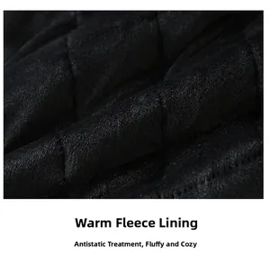 Close-up of black quilted fleece jacket lining with anti-static and warm thermal texture