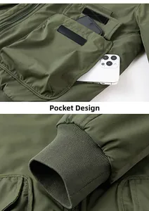 Detail of army green flight jacket featuring large cargo pockets and ribbed cuffs