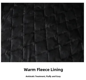 Detail of black fleece lining with diamond quilting featuring anti-static and thermal warmth