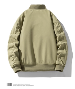 Rear view of light olive green bomber jacket with ribbed collar and drop shoulder details