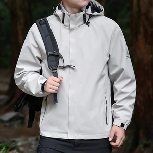 Men's light grey hooded outdoor windbreaker jacket with tactical techwear design and adjustable cuffs